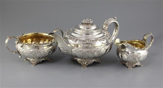 A George IV silver three piece tea set by Richard Pearce & George Burrows, gross 45 oz.